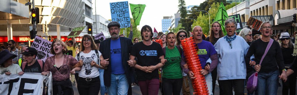 Rebels linking arms and marching together